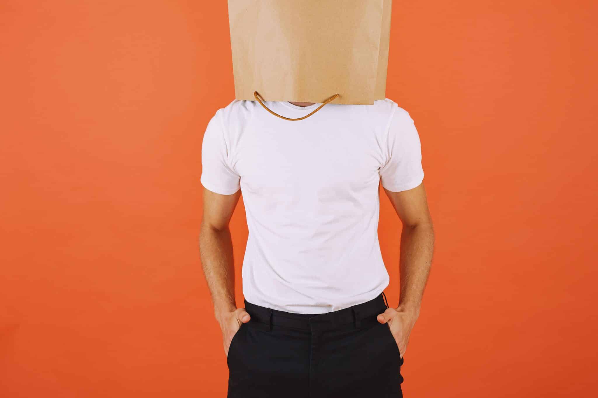 Man with paper bag over his head