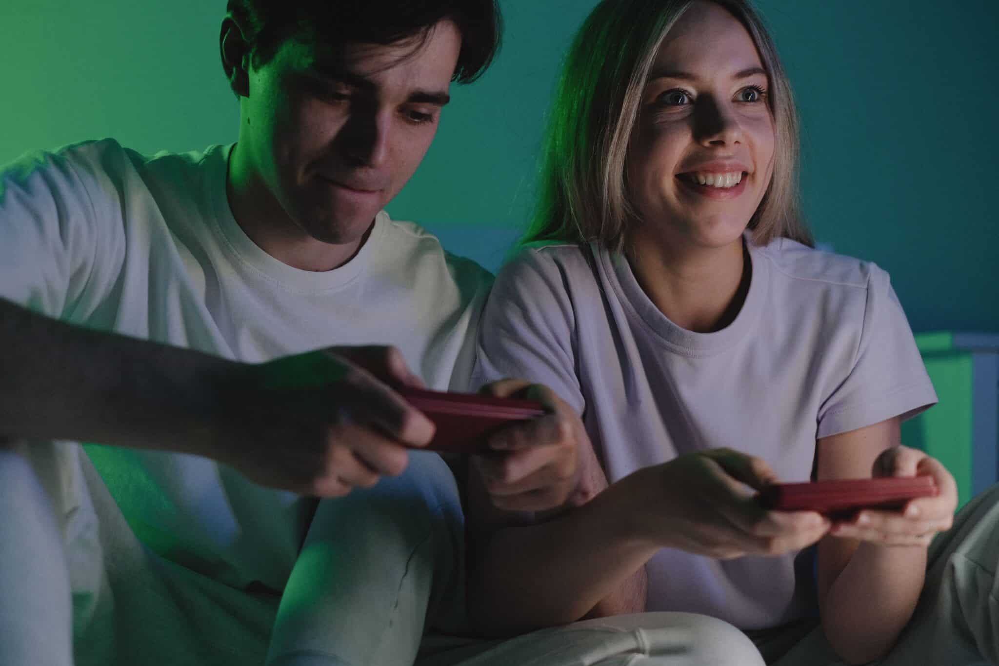 Man and woman playing video games
